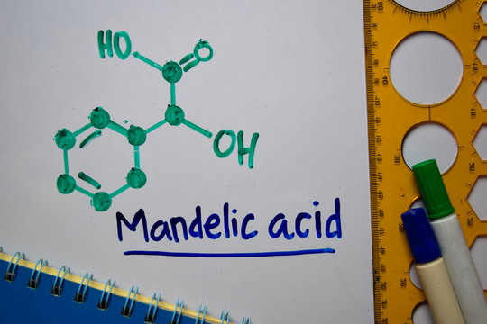 Mandelic Acid. Aromatic hydroxy acid molecule write on the white board. Structural chemical formula. Education concept
