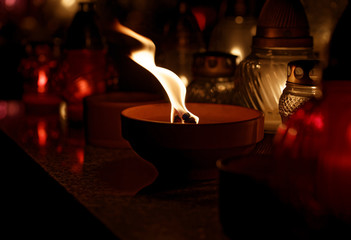 Candles Burning At a Cemetery During All Saints Day