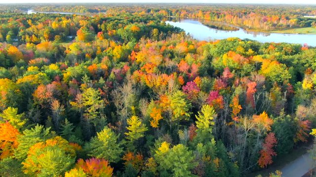 Scenic Autumn flight over the Menominee River, Fall colors. The Menominee River flows along the border of Wisconsin and Upper Michigan.