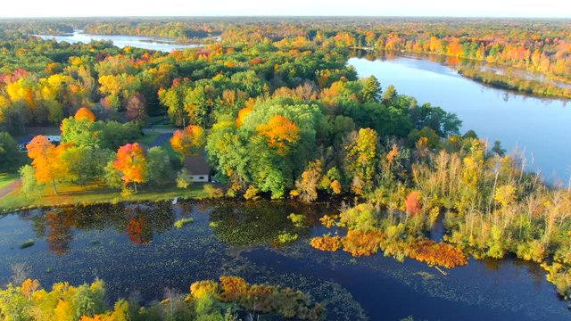 Scenic Autumn flight over the Menominee River, Fall colors. The Menominee River flows along the border of Wisconsin and Upper Michigan.