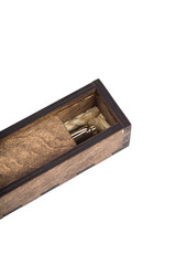 Beautiful wooden box with ballpoint pen inside on a white background.