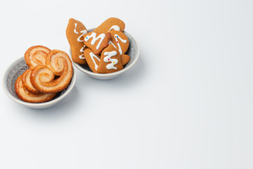 Images of cookies and sweets in a warm environment and with a white background.