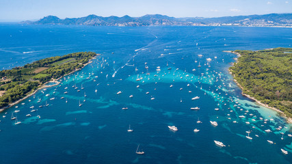 Aerial drone shot view of yachts between Ile Sainte Marguerite and Ile Saint Honorat in...