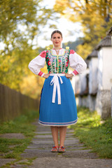 Young beautiful slovak woman in traditional costume