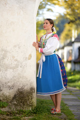 Young beautiful slovak woman in traditional costume