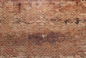 big old wall background with a lot of red, brown and orange bricks damaged texture