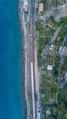 Overhead aerial view of railway along the sea between Corniglia and Manarola