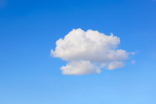 One cloud in a blue sky