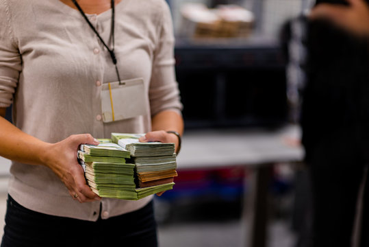 Counting Person Handling Stacks Of Euro € Cash At The Treasury Department