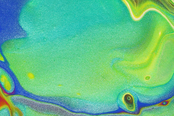 Colors of the ocean coalesce in aquamarine, royal blue, metallic teal, neon green and purple to create this colorful and whimsical abstract background.