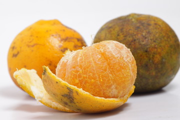 Orange fruit on a white isolated background