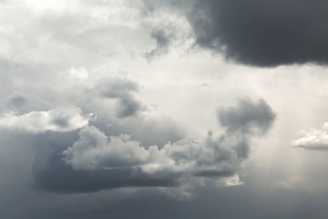 Fototapeta na wymiar Stormy clouds in the blue sky