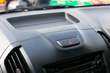 Detail of a warning button in a car