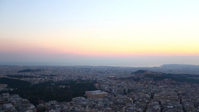 Sunset in Panoramic view of Athens in a  beautiful day. Capital city of Greece