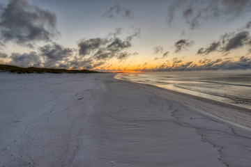A View down Okaloosa Beach, Florida just before Sunrise
