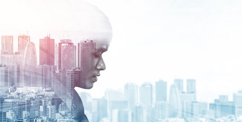 Double Exposure Image of Business Person on modern city background. Future business and...