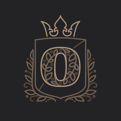 O letter logo consisting of floral pattern letters in a heraldic shield with crown.
