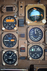 Close up on flight instruments on a commercial aircraft.