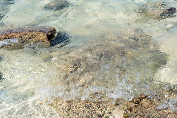 Background, abstract unique texture of the sea, stone on the shore.