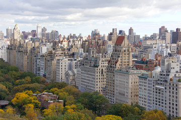 Buildings around Central Park in New York City. Aerial view from above on a cloudy overcast autumn day