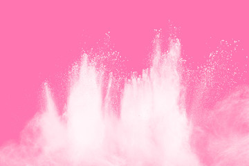 Freeze motion of white particles on pink background.Abstract white dust explosion.