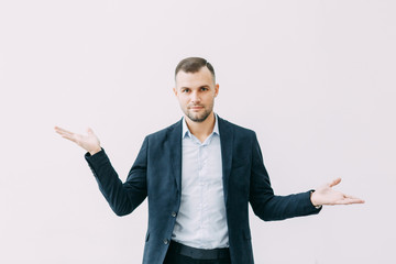 Emotions, smiles and choice of options. Business portrait of a young man.