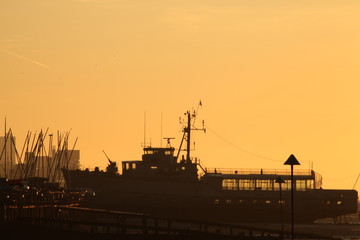 Silhouette at Dawn of a Boat