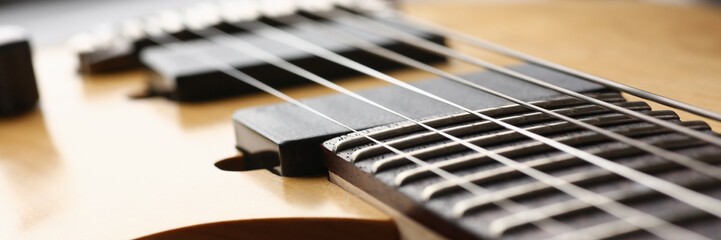 Classic shape wooden electric guitar with rosewood neck