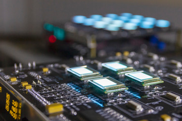 The process of checking several oled displays of white color on the test station. Displays glow...
