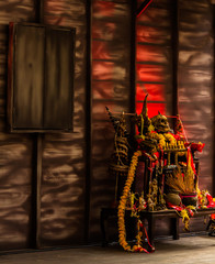 Fototapeta na wymiar Horror scary Halloween altar table decoration in Thai halloween theme.