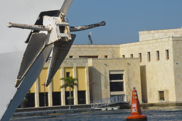 Close up of anchor on a ship with red bouy in the background