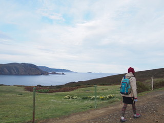 A woman strolling around the island, Bruny Island, Tasmania, Australia