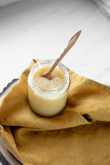 Vegan coconut condensed milk in jar