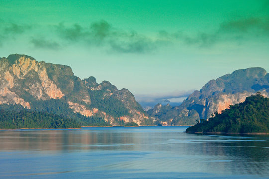 limestone Mountain and morning mist and beautiful view neture in the Cheow Lan dam Khao Sok National Park, Thailand