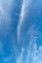 Bright, blue sky with a few small clouds
