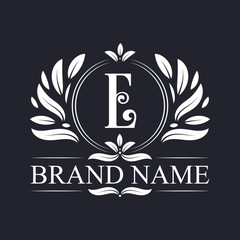 Vintage ornamental E logo design. Luxurious & elegant alphabet E letter logo design template.