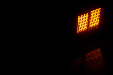 Landscape warm light from window and dark wall, yellow light from window in the dark