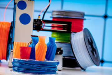3D Printer Plastic filament for 3D printer and printed products in the interior of the design office
