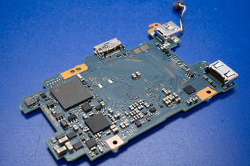 Motherboard mainboard digital photo camera. Electronic circuits and computer chips.