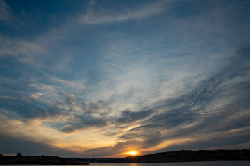 Obraz premium Sunset over mediterranean sea Beautiful cloudscape over the sea, sunrise / sunset shot.