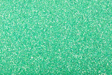 Light green holographic glitter background, elegant texture for your new holiday desktop.