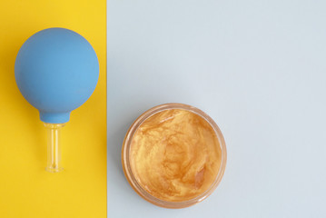 vacuum can to massage the face and oil.  minimalist creative concept.