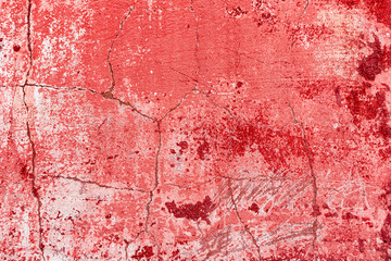 Texture of a concrete wall with cracks and scratches which can be used as a background