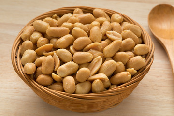 Basket with salted peanuts