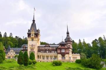 Sinaia, Romania - August 2019. Great Pelesh castle and park in Sinaia, Romania. Romania King Carol Palace and park with medieval beautiful buildings 