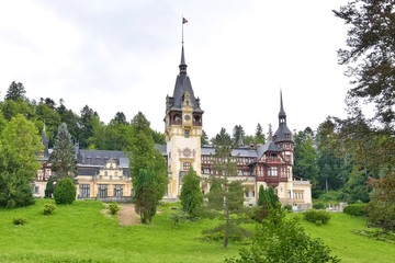 Sinaia, Romania - August 2019. Great Pelesh castle and park in Sinaia, Romania. Romania King Carol Palace and park with medieval beautiful buildings 