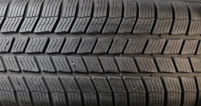 Tire of a car strating to spin slowly, high quality 60fps 4k