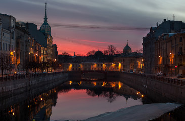 Fototapeta na wymiar River Moyka and Red Bridge (Krasniy most), Saint Petersburg at dawn