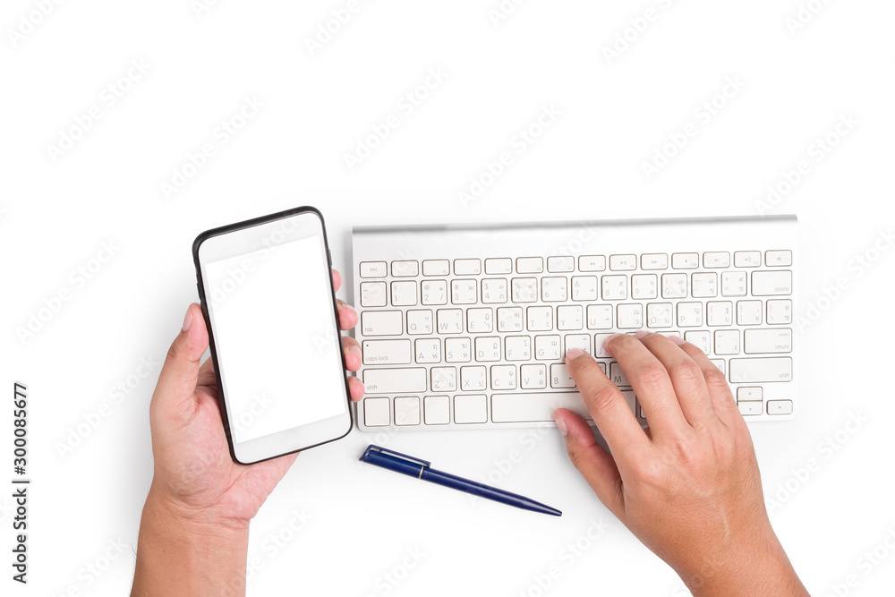 Poster top view of hand is holding the mobile phone to see the information and typing that information on t
