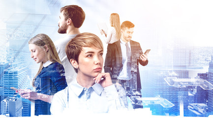 Pensive young business team in city